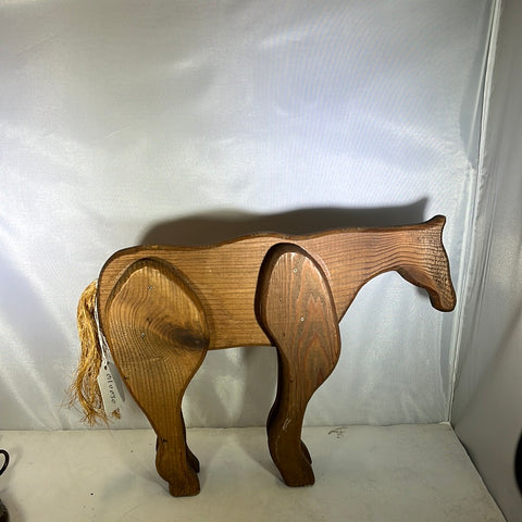 Carved wooden horse statue