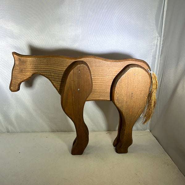 Carved wooden horse statue