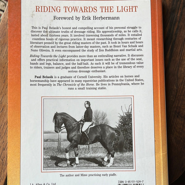 Riding Towards the Light: An Apprenticeship in the Art of Dressage Riding - gently used Paperback – 1990 by Paul Belasik